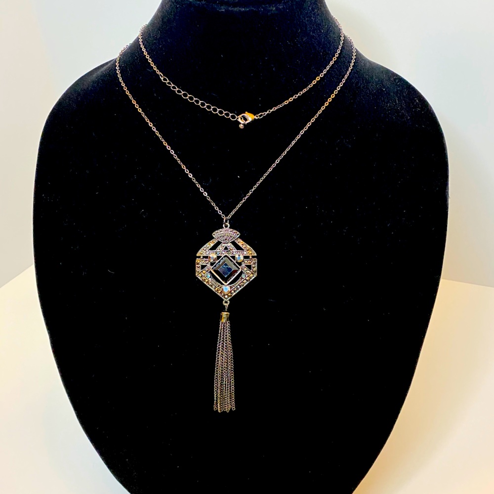 Long necklace with black accent stones